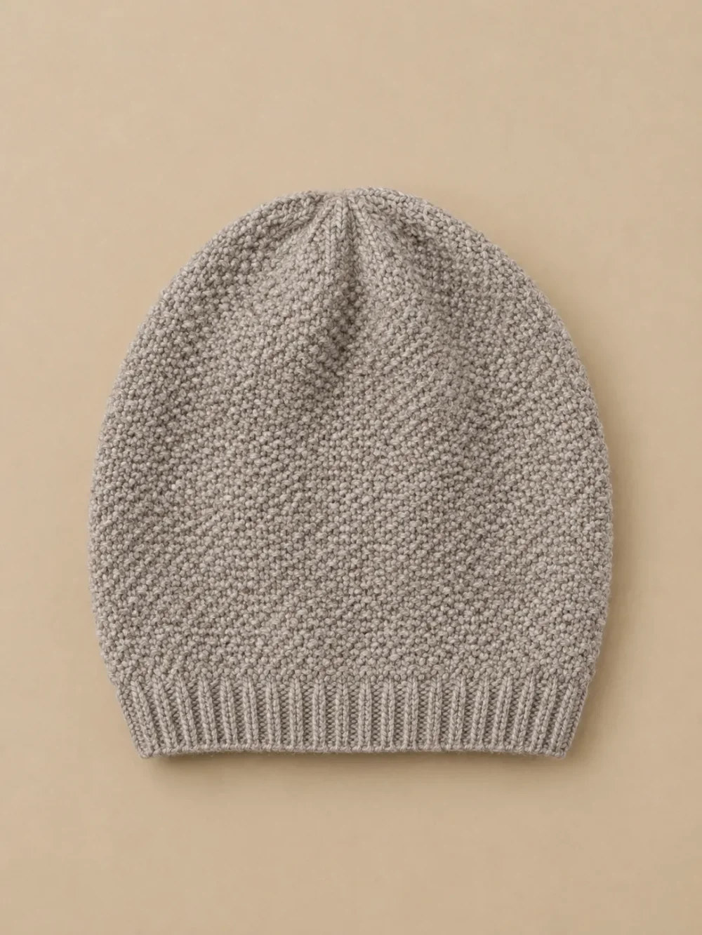 Bight Moss-Stitch Beanie – Pebble, laid flat, front