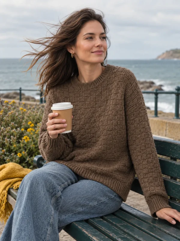 Malin Basketweave Crew – Driftwood, worn outdoors by the sea