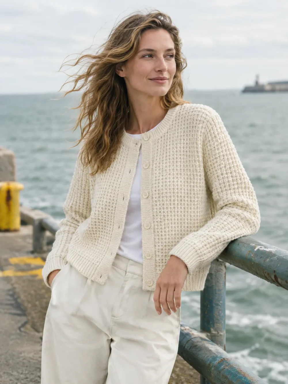 Malin Waffle Crop Cardigan – Salt, worn outdoors by the sea